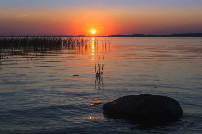 Masurian Lake District: Canoe and Sailing Tour from Warsaw - Exploring Mikołajki: The Lakeside Town