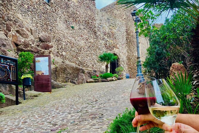 Medieval Village Walking Tour with Aperitif in Castelsardo - Practical Details and Group Size