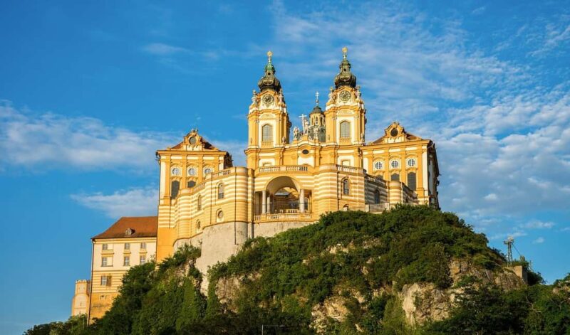 Melk Abbey, Salzburg, and Traunsee Day Trip by Van - Key Points