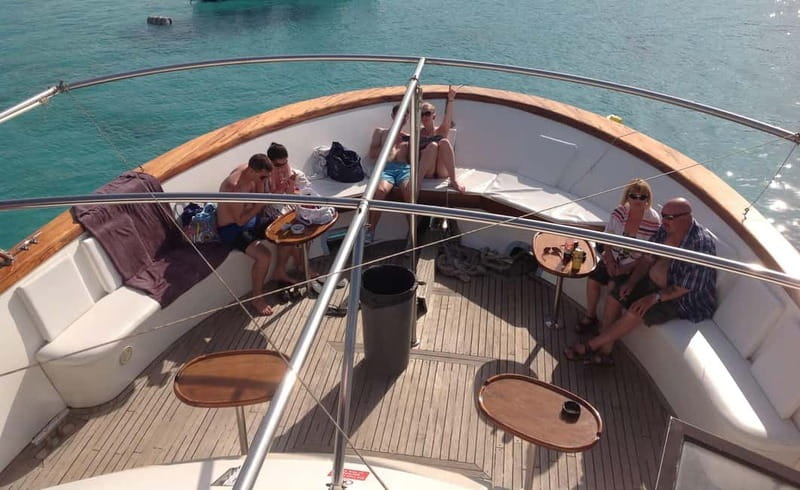 Mellieha: Round Comino, Blue Lagoon & Gozo Cruise with Water - Onboard Facilities and Included Amenities