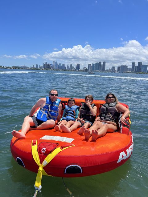 Miami: Adventure Cruise with Jetski, Tubing, and Drinks - Enjoying Snacks and Drinks on the Water
