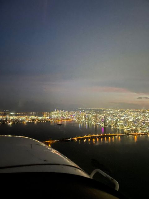 Miami Beach: Night Lights Private Air Tour - Free Champagne - Enjoying Non-Alcoholic Champagne in the Sky