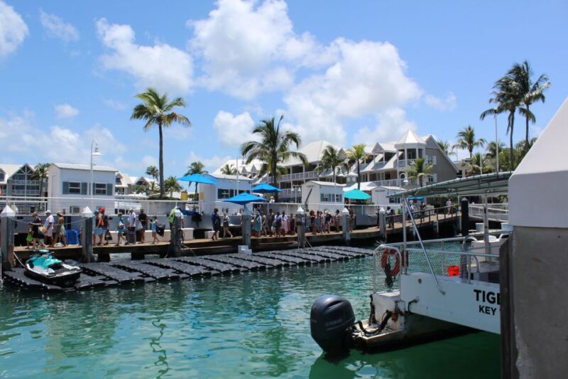 Miami: Key West Boat Tour w/ Optional Snorkeling & Open Bar - Boarding the Key West Boat and Coastal Views
