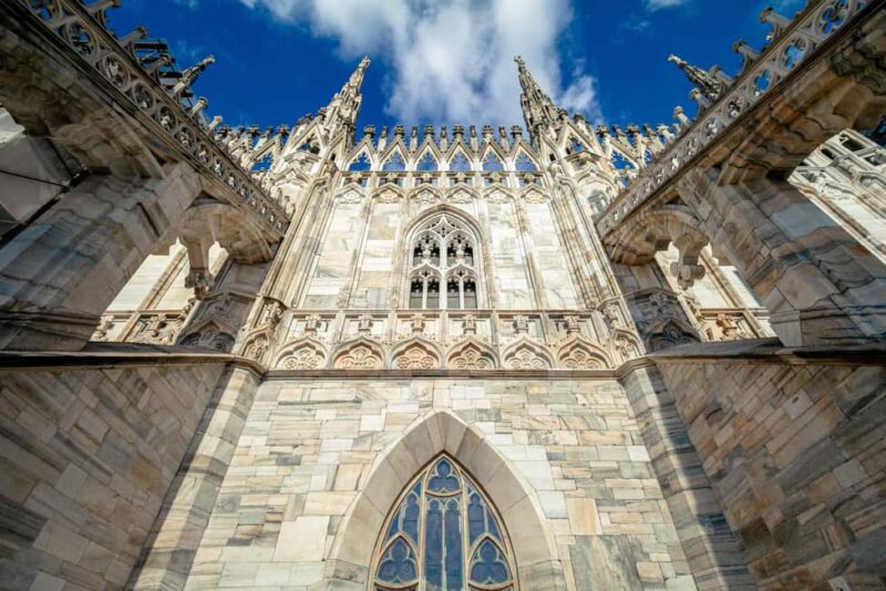 Milan Duomo Cathedral and Rooftop Terrace Guided Tour - Discovering Secrets and Stories from Your Guide