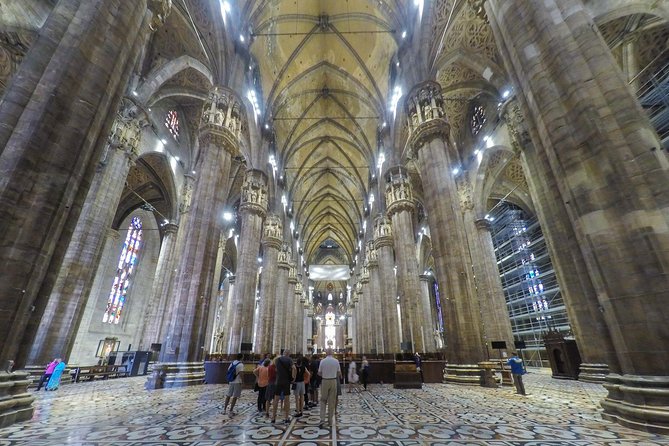 Milan Super Saver: Skip-the-Line Duomo and Rooftop Guided Tour - The Climb Down and Tour End: Physical Considerations