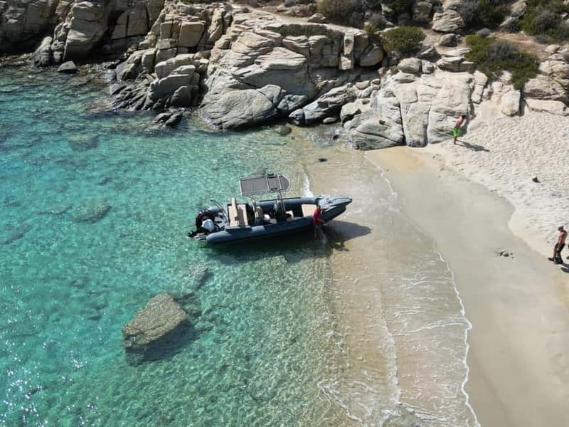 Milopotas: Best Beaches Boat Cruise with Snorkeling - Snorkeling and Cave Exploration at Never Bay