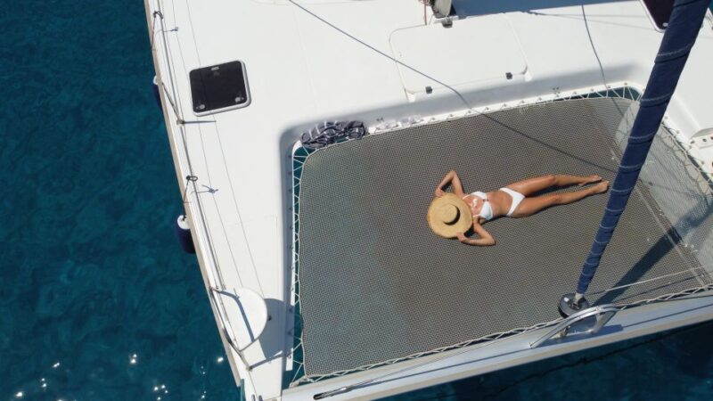 Milos: Full day Milos and Poliegos Catamaran Cruise - Savoring Greek Food and Refreshments on Board