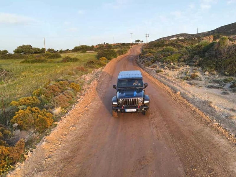 Milos: Luxury Sunset Jeep Safari with Picnic - Watching the Sunset at Ammoudaraki Beach