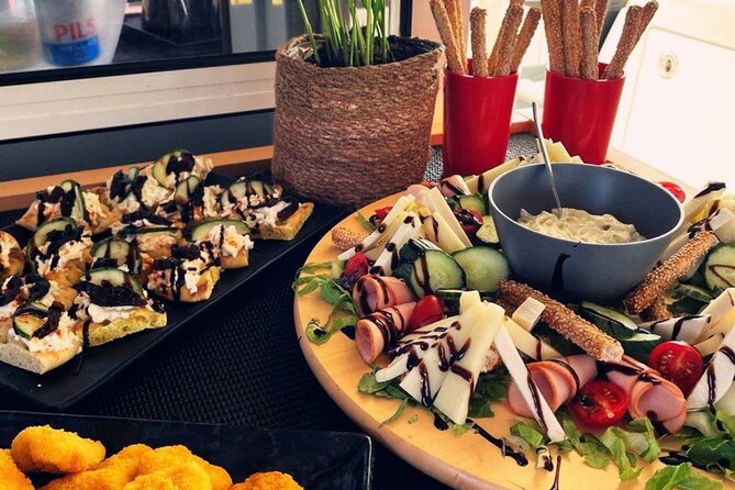 Milos Sunset Catamaran Cruise to Kleftiko Bay with Meal & Drinks - A Gourmet Mediterranean Dinner on Board