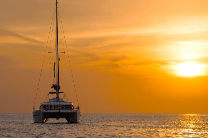 Milos Sunset Catamaran Cruise to Kleftiko Bay with Meal & Drinks - Sunset Views and Relaxation on the Return Voyage