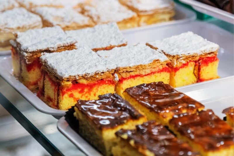 Modena: Guided Food Tour with 10+ Local Delicacies Tastings - Tasting a Classic Modenese Pasta Dish at a Historic Trattoria