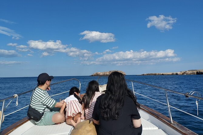 Monopoli Shared tour by Gozzo boat to the Polignano caves - Explore the Stunning Caves of Polignano a Mare by Gozzo Boat