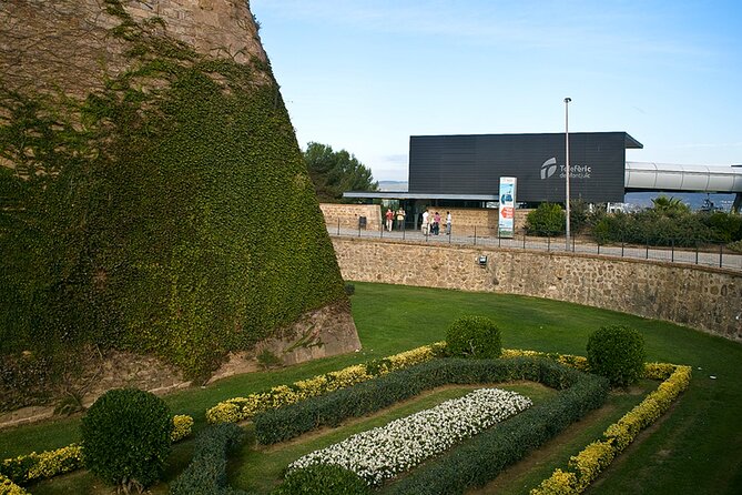 Montjuïc Cable Car Entry Voucher with Audio Tour on Your Phone - Exploring Montjuïc Castle and Its Surroundings