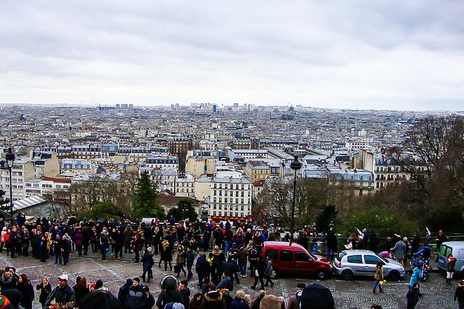 Montmartre Walking Tour with a Private Local Guide - Visiting Café des Deux Moulins, the Filming Location of “Amélie”