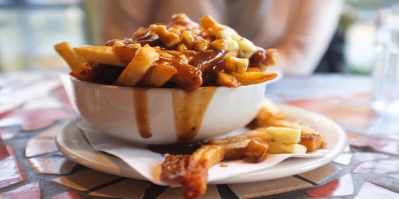 Montreal: Best of Montreal Food Walking Tour with Tastings - A Classic Canadian Dish: Montreal Poutine