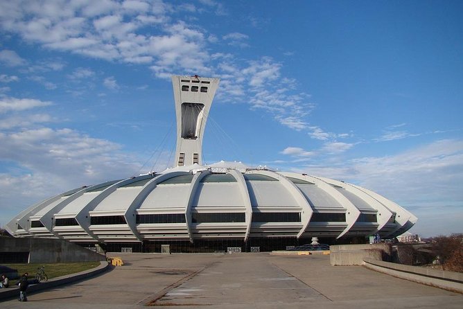 Montreal City Sightseeing Tour with Live Commentary - Unmissable Landmarks: Notre-Dame Basilica and Olympic Stadium