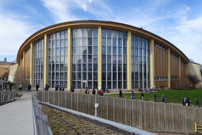 Montreal Olympic Park Self-Guided Walking Tour and Scavenger Hunt - Visiting the Montreal Olympic Village and the Leaning Tower