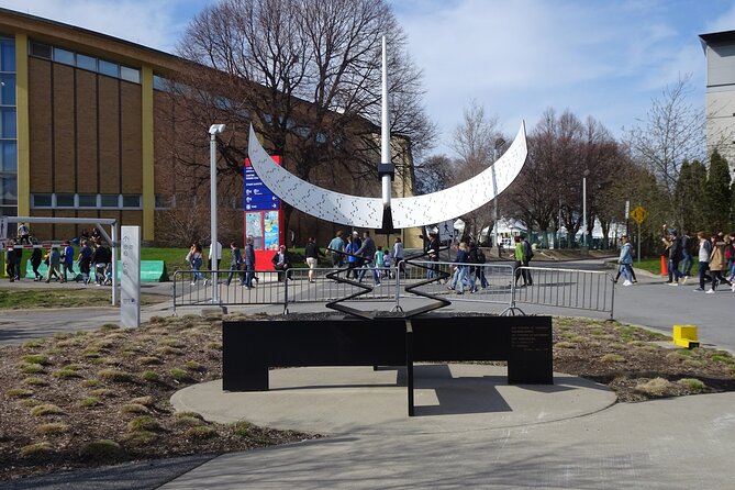 Montreal Olympic Park Self-Guided Walking Tour and Scavenger Hunt - Visiting the Montreal Planetarium and Pierre Charbonneau Center