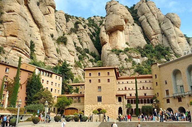 Montserrat and De Poblet Monastery - Reduced group hotel pick up from Barcelona - Walking Through the UNESCO-Listed Poblet Monastery