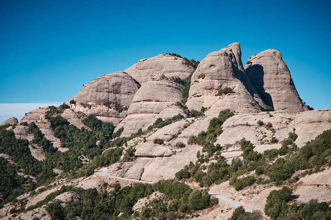 Montserrat Monastery and Hiking Experience - Guided Exploration of Montserrats Natural Landscape