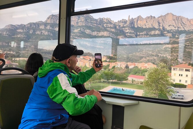 Montserrat Small Group with Cable Car and Cogwheel Train - Starting Point at Plaça dEspanya and the Journey to Montserrat