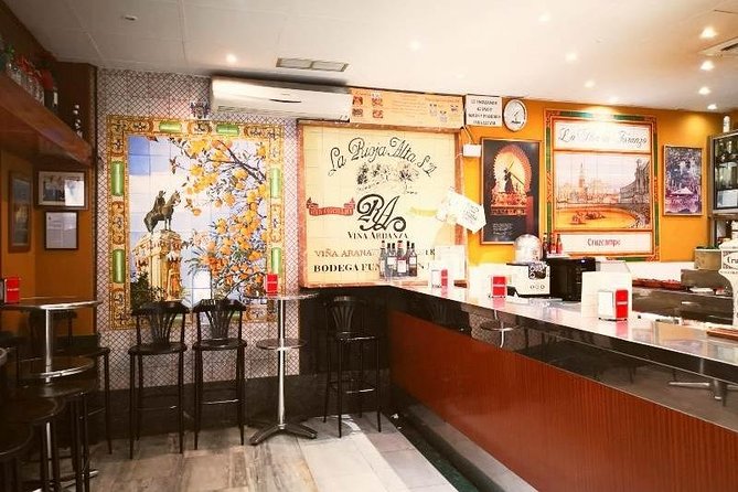 Morning Walk with Breakfast, Market tastings & Authentic Flavoured Tapas Lunch - Traditional Sevillian Breakfast in a Classic Tiled Bar