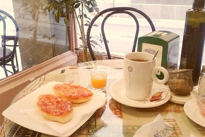 Morning Walk with Breakfast, Market tastings & Authentic Flavoured Tapas Lunch - Exploring the Triana Market