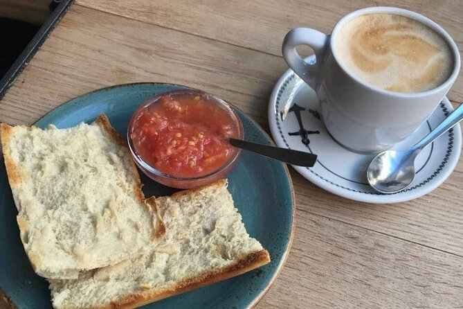 Morning Walk with Breakfast, Market tastings & Authentic Flavoured Tapas Lunch - Meal and Market Tastings: Cheese, Ham, Churros & Fried Fish