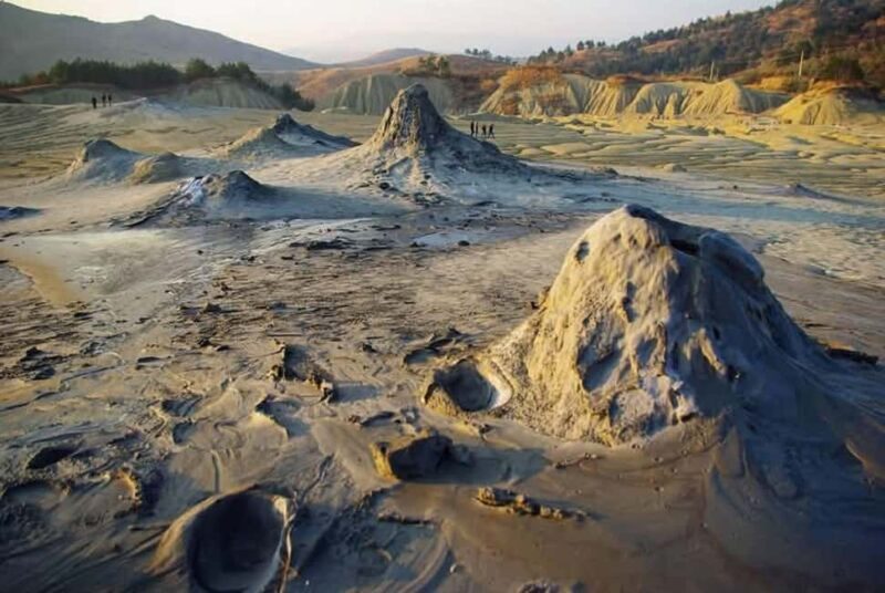 Mud Volcanoes & Trovants, Bison Sanctuary, Waterfall, Lakes. - The Serenity of Lake Siriu and Its Scenic Surroundings