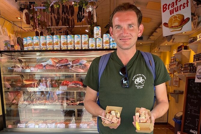 Munich 2 Hour Food Power Tour - Sampling Schmalznudel at Cafe Frischhut