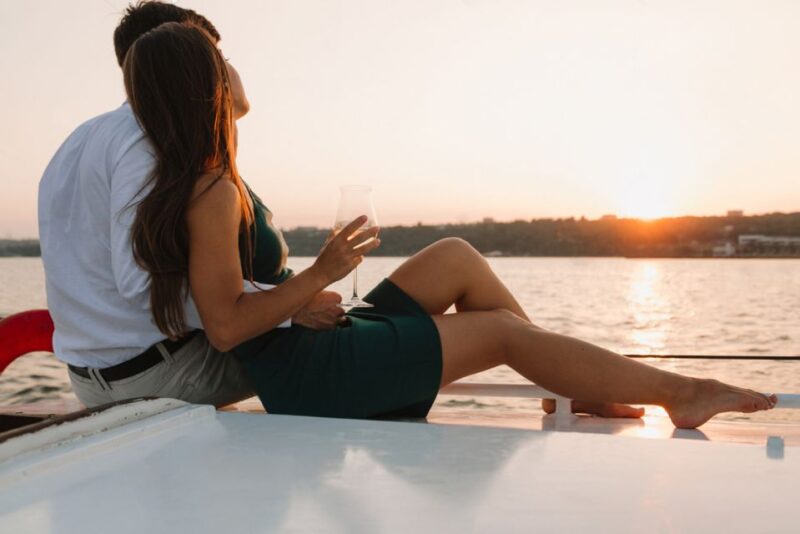 Mykonos: Catamaran Cruise with Lunch, Drinks and Transfer - Anchoring at Rhenia: Swimming in Crystal-Clear Waters