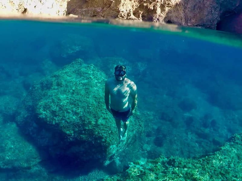 Mykonos: Delos and Rhenia Land Cruise with Fruit and Snacks - Onboard Comforts: Snacks, Drinks, and Party Vibes