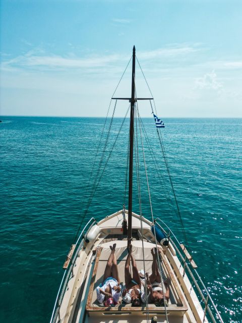 Mykonos: Private Cruise by Wooden Boat with Snorkeling - Key Points