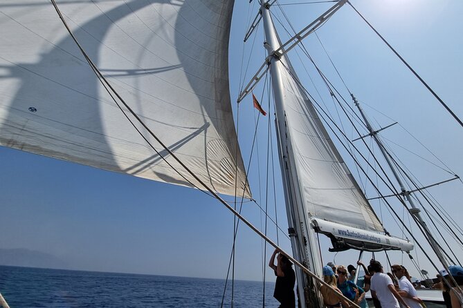 Mykonos Sail Cruise to Rhenia, Guided Tour of Delos, Lunch&Drinks - Tasting Greek Cuisine: Onboard Lunch and Drinks