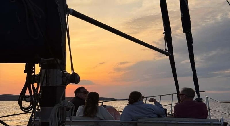 Mykonos: Sunset Boat Cruise with Light Dinner & Drinks - Experience the Magic of Mykonos Sunset on a Boat
