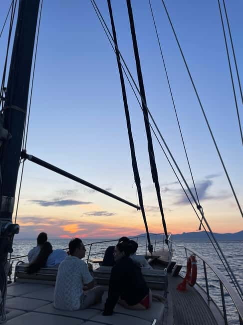 Mykonos: Sunset Boat Cruise with Light Dinner & Drinks - Passengers Enjoy Scenic Bays of Mykonos