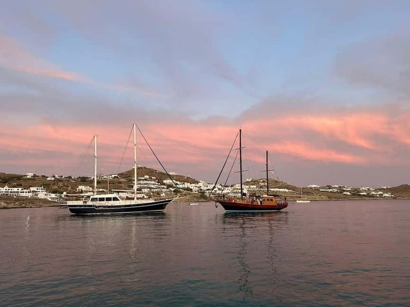 Mykonos: Sunset Boat Cruise with Light Dinner & Drinks - Longer Stop at Elia Bay for Swimming and Snorkeling