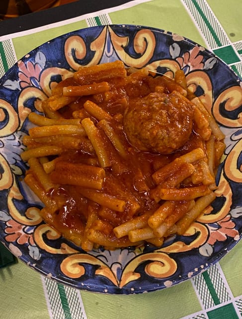 Naples: Authentic Family Home Lunch with Music Show & Spanish Quarters Tour - Musical Surprises and Local Stories During Lunch