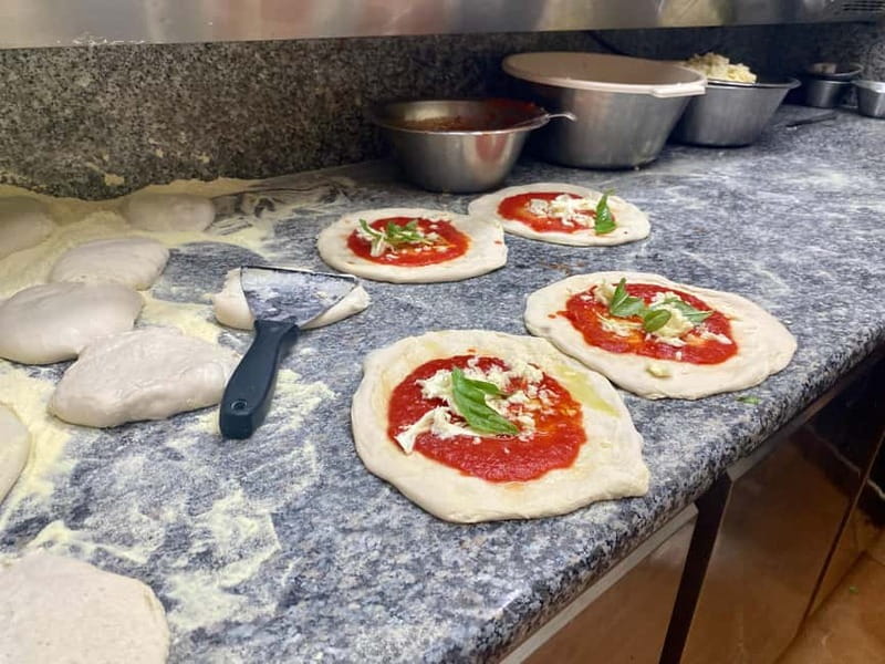 Naples: Old City Center Street Food Tour with Spritz - Exploring Spaccanapoli: The Heart of Naples’ Old Town