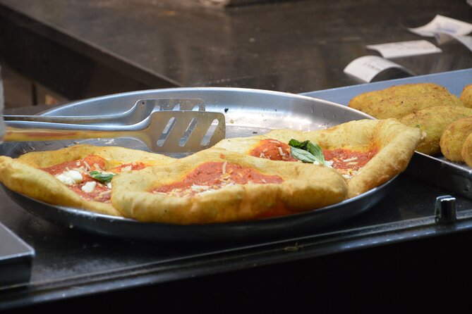 Naples Street Food Scene Tour: Small-Group Tasting Adventure - The First Stop: Traditional Tarallo and Folded Pizza