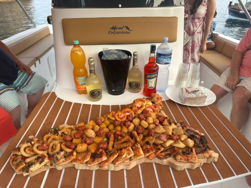 Naxos: Cruise on Isola Bella with swimming, fruit & prosecco - Stops for Swimming in Emerald Waters