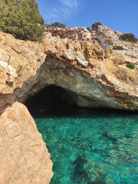 Naxos: Explore the cave of the unspoiled south-east coast! - From Hike to Boat: A Traditional Cycladic Wooden Ride