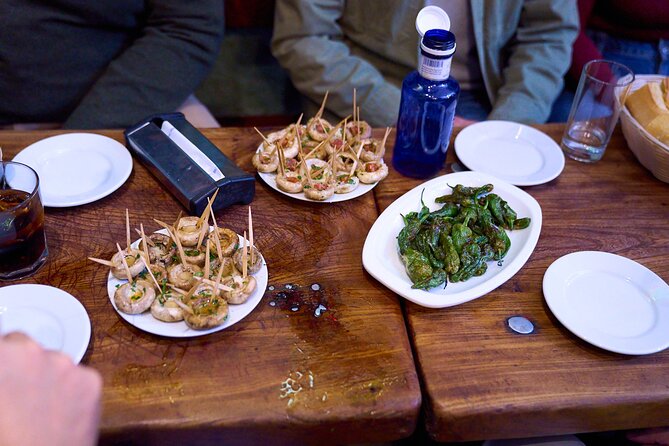 New! Madrid: Not Just Another Tapas & Wine Tour by Eating Europe - Exploring the Literary Quarter and Marketplaces