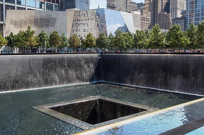 New York Main Attractions Tour with City Bus & Subway! - Reflecting at the 9/11 Memorial & Museum and the Wall Street Bull