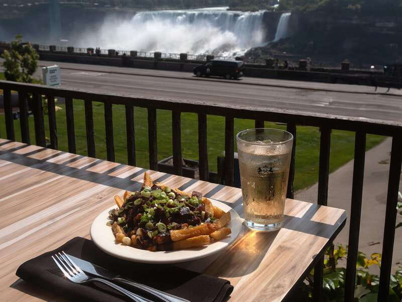 Niagara Falls, All Canadian Food Small Group Walking Tour - Savoring Montreal Smoked Meat Poutine with Falls Views