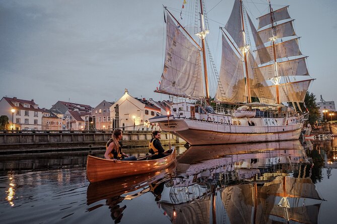 Night Canoe City Tour in Klaipeda - Cruising Under the Bridge and Past the Old Town Fountain