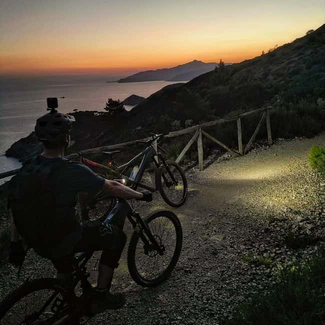 Night e-bike tour in Capoliveri with a musical experience on the beach - Key Points