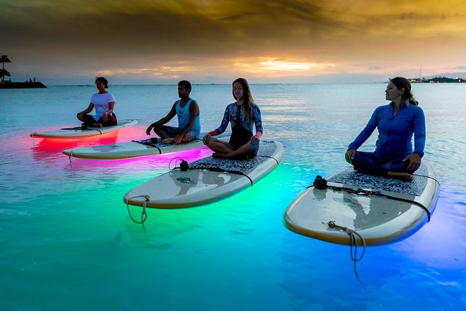 Night SUP Yoga in Honolulu, Hawaii - The Magic of Practicing Yoga at Sunset and Night
