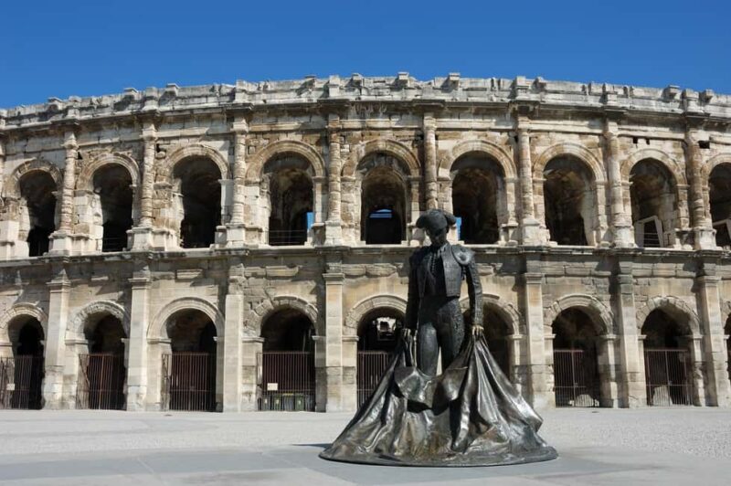 Nimes: Ancient Roman Arena Ticket & Old Town Audio Tour - Discover Nimes Roman Heritage and Authentic Old Town