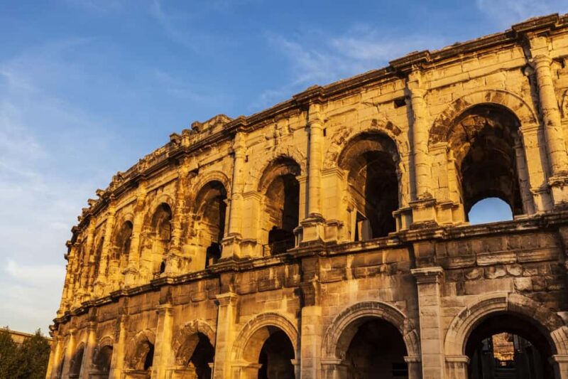 Nimes: Ancient Roman Arena Ticket & Old Town Audio Tour - Navigating the Old Town with a Smartphone App